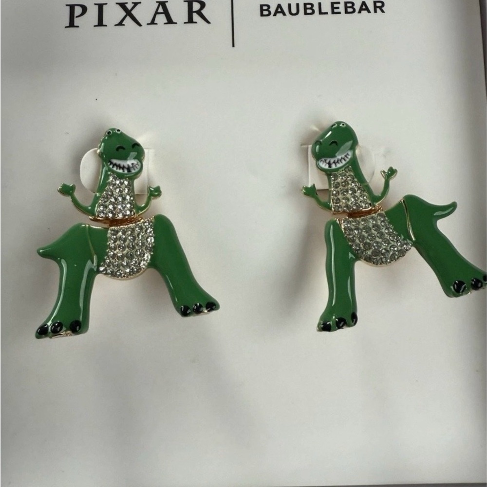 BaubleBar Green and Silver Dinosaur Earrings